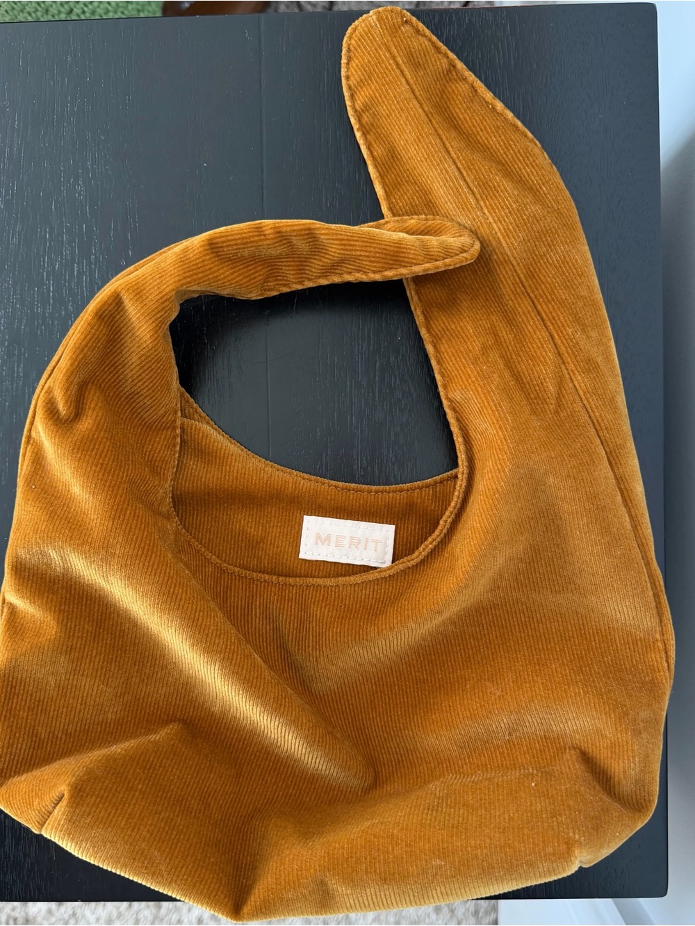 Merit Beauty Signature Makeup Bag in a warm brown corduroy material